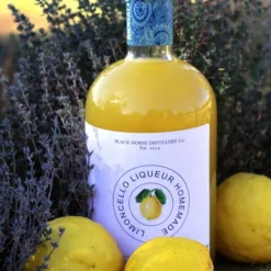 Limoncello Bottle and Lemons